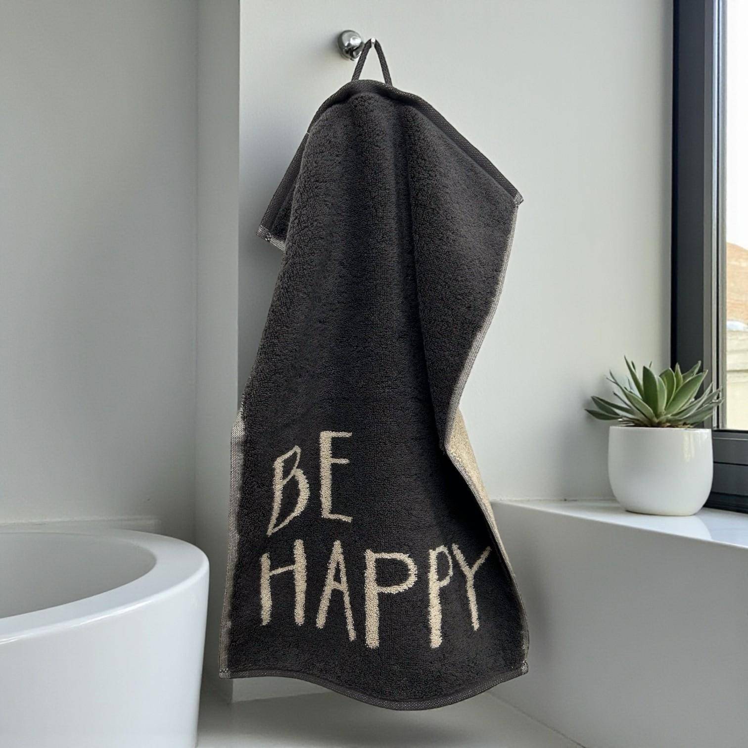 Cawö Frottiertuchserie Postcard Towels Edition 100 Be Happy Gästetuch in Schwarz 30 x 50 cm