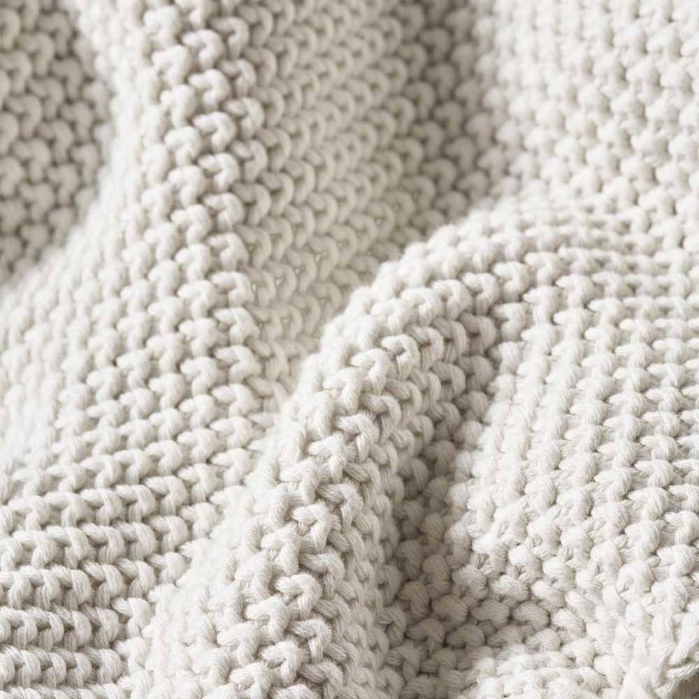 Marc O’Polo Plaid Nordic Knit Off White, Detailaufnahme der groben Strickstruktur